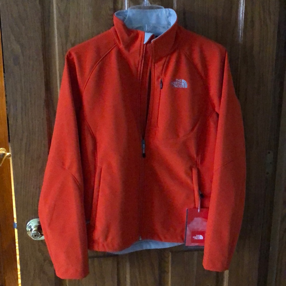 Orange North Face jacket